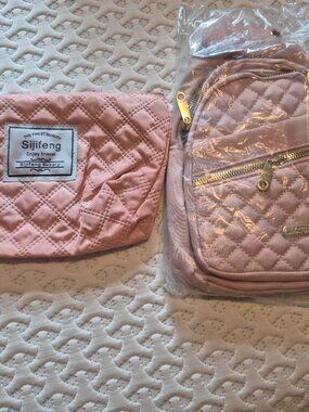 Pink cross body and make up bags